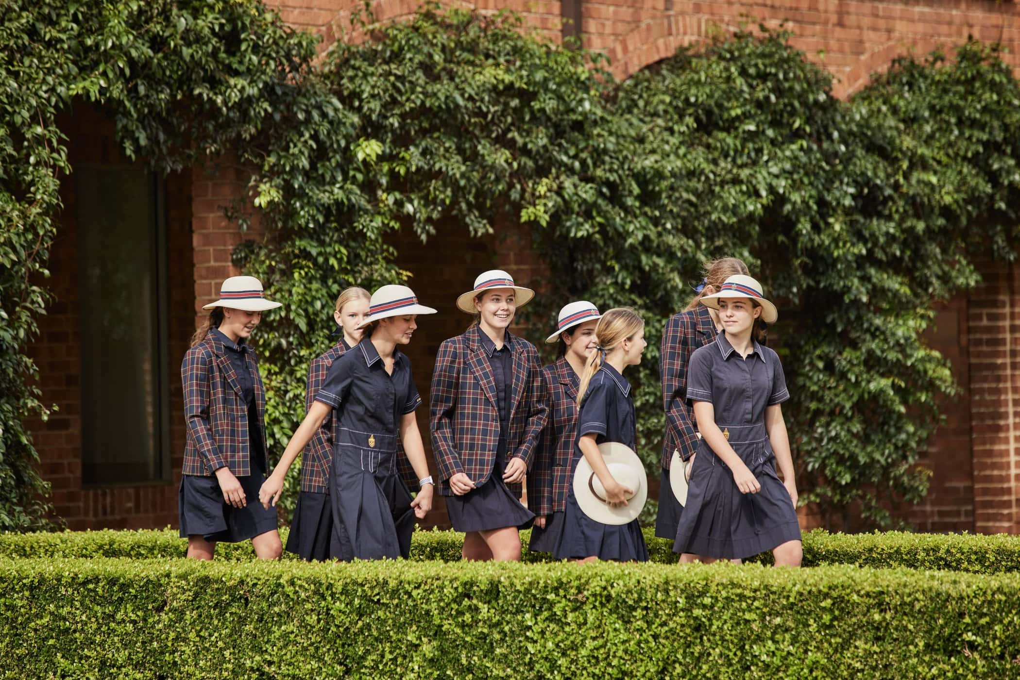 Senior school students walking through the cloisters at St Catherine's - educating young women